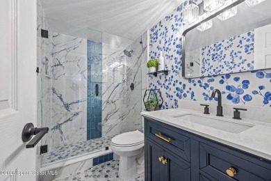 Step into this COMPLETELY RENOVATED riverfront condo & enjoy