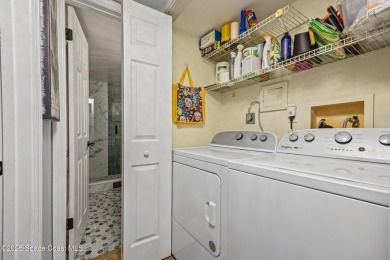 Step into this COMPLETELY RENOVATED riverfront condo & enjoy