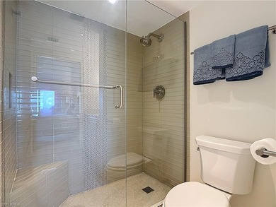 Now offering this designer updated condo in the heart of Naples!