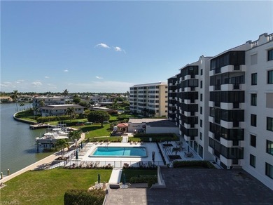 Now offering this designer updated condo in the heart of Naples!