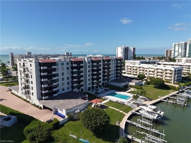 Now offering this designer updated condo in the heart of Naples!