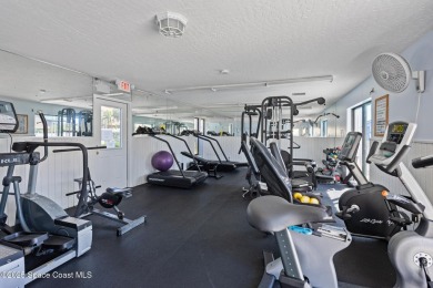 Step into this COMPLETELY RENOVATED riverfront condo & enjoy