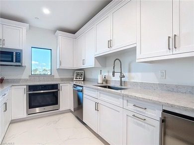 Now offering this designer updated condo in the heart of Naples!