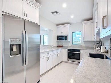 Now offering this designer updated condo in the heart of Naples!