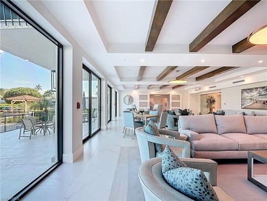 Now offering this designer updated condo in the heart of Naples!