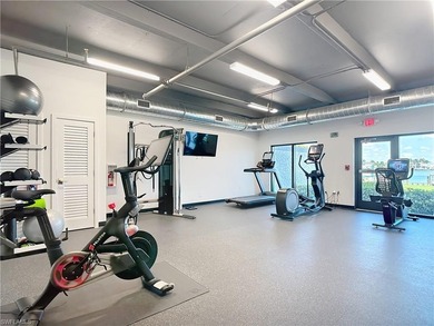 Now offering this designer updated condo in the heart of Naples!