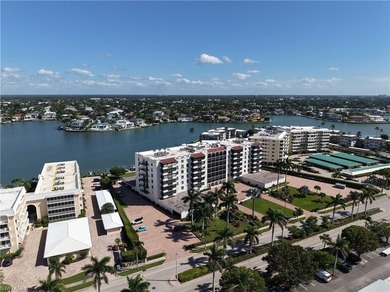 Now offering this designer updated condo in the heart of Naples!