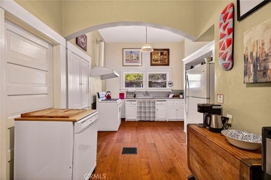 Discover a rare investment opportunity with two charming homes