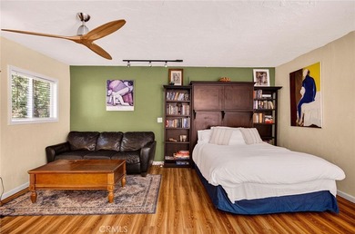 Discover a rare investment opportunity with two charming homes