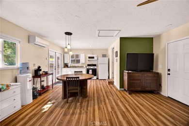 Discover a rare investment opportunity with two charming homes