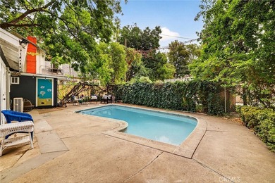 Discover a rare investment opportunity with two charming homes