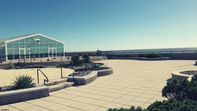 This beautiful condo features stunning views of the beach, ocean