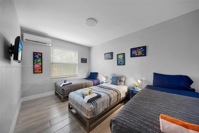 This charming 3-bedroom, 2-bath single-family home as well as a