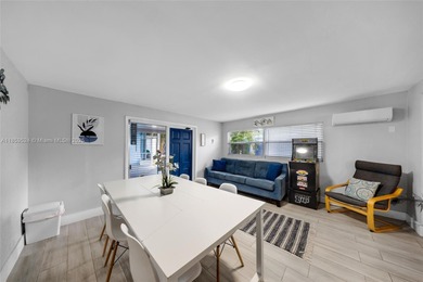 This charming 3-bedroom, 2-bath single-family home as well as a