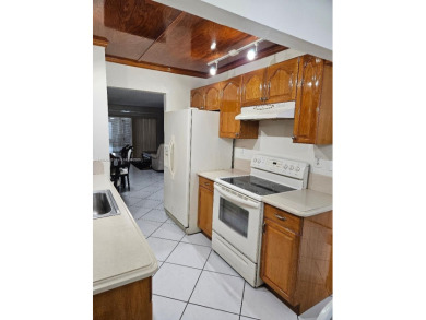 Spectacular 3rd floor unit, diamond design tile flooring in