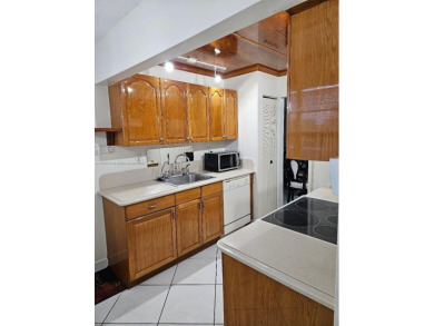 Spectacular 3rd floor unit, diamond design tile flooring in