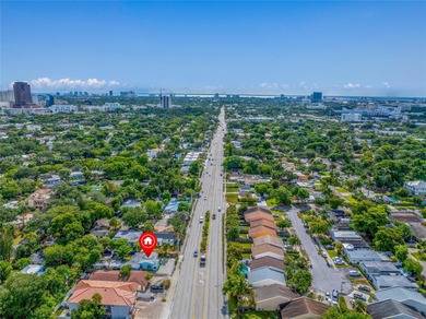This charming 3-bedroom, 2-bath single-family home as well as a