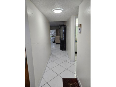 Spectacular 3rd floor unit, diamond design tile flooring in