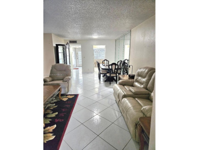Spectacular 3rd floor unit, diamond design tile flooring in