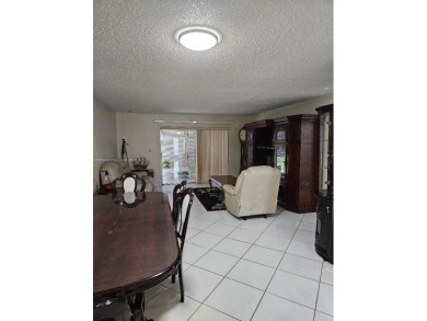 Spectacular 3rd floor unit, diamond design tile flooring in