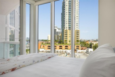 Welcome to Residence 703 at Murano Portofino, where water