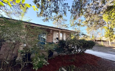 Beautifully refreshed brick home on 1 full acre just off US Hwy