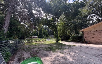 Beautifully refreshed brick home on 1 full acre just off US Hwy