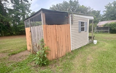 Beautifully refreshed brick home on 1 full acre just off US Hwy