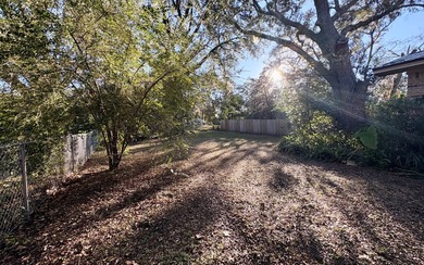 Beautifully refreshed brick home on 1 full acre just off US Hwy