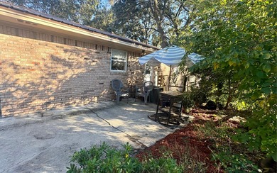 Beautifully refreshed brick home on 1 full acre just off US Hwy