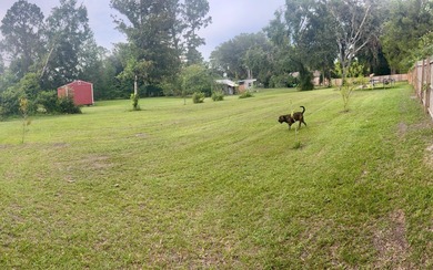 Beautifully refreshed brick home on 1 full acre just off US Hwy