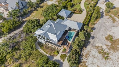 A rare offering on Sanibel's exclusive Joewood Drive, this