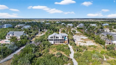 A rare offering on Sanibel's exclusive Joewood Drive, this