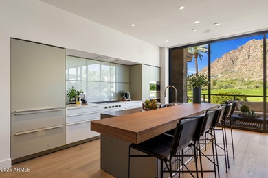 Experience the epitome of elegance and modern living in this