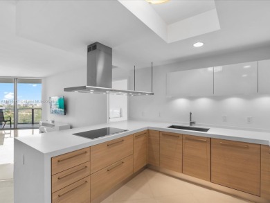 Discover waterfront luxury in this spacious 2-bedroom + den