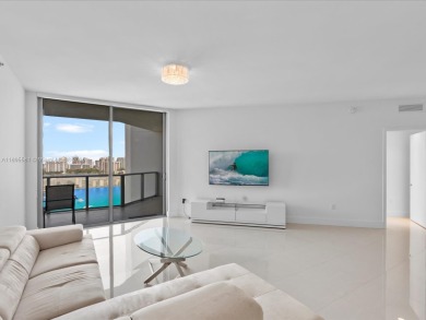 Discover waterfront luxury in this spacious 2-bedroom + den