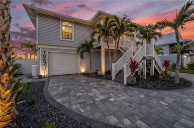 Located on the quiet South End of Estero Island, this stunning
