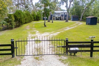 Suwannee Riverfront Living at Its Best! This beautifully updated