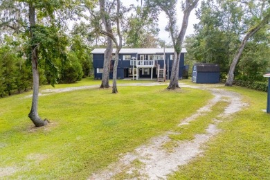 Suwannee Riverfront Living at Its Best! This beautifully updated
