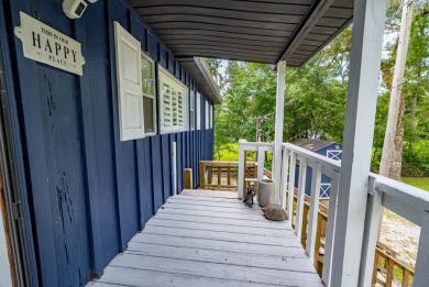 Suwannee Riverfront Living at Its Best! This beautifully updated