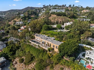 Welcome to this Majestic Gated Italian Villa nestled behind