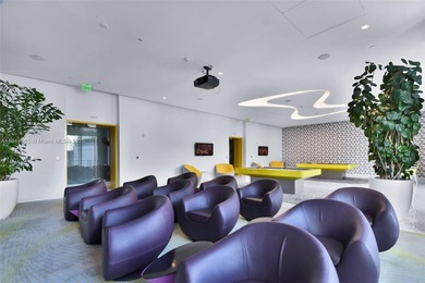 Beautiful 2 bedroom, 2 bath corner apartment with a den that can