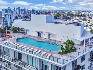 Beautiful 2 bedroom, 2 bath corner apartment with a den that can