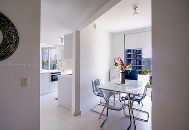 Beautiful 2 bedroom, 2 bath corner apartment with a den that can