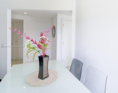 Beautiful 2 bedroom, 2 bath corner apartment with a den that can