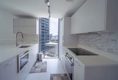 Beautiful 2 bedroom, 2 bath corner apartment with a den that can