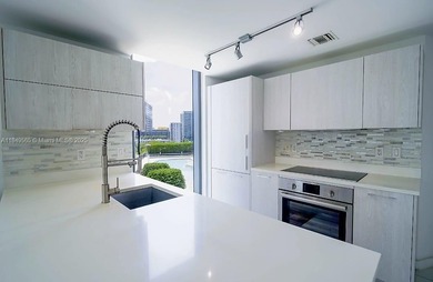 Beautiful 2 bedroom, 2 bath corner apartment with a den that can