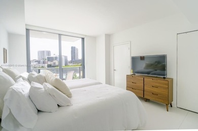 Beautiful 2 bedroom, 2 bath corner apartment with a den that can