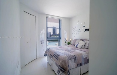 Beautiful 2 bedroom, 2 bath corner apartment with a den that can