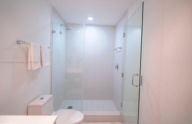 Beautiful 2 bedroom, 2 bath corner apartment with a den that can